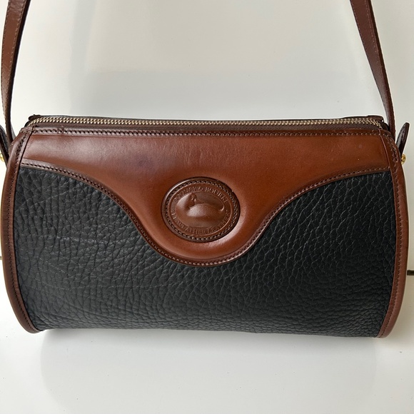 Dooney & Bourke Handbags - Vintage DOONEY And BOURKE All Weather Leather Black/Brown Shoulder Bag.
